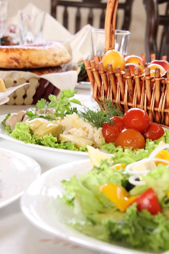 A delightful spread of fresh salads and appetizers at an indoor brunch setting.